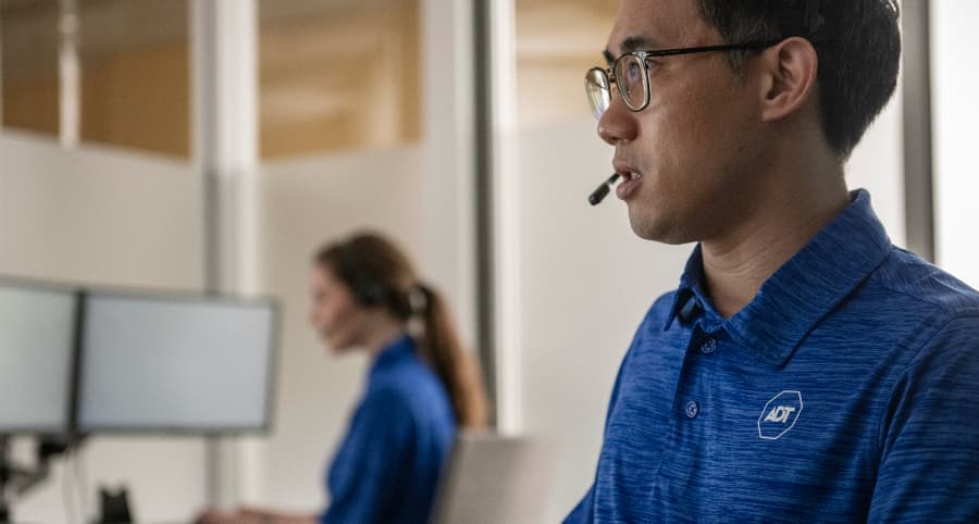 ADT employee in a monitoring station